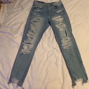 Destressed light denim mom jeans